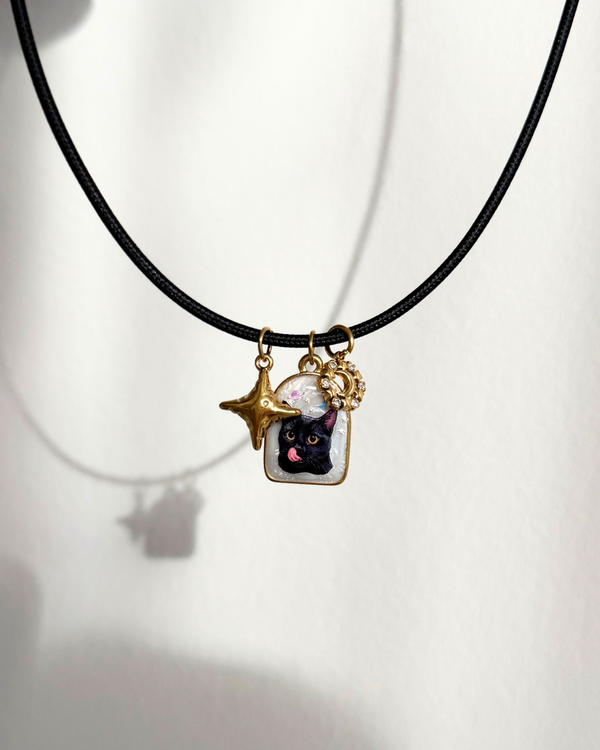 Charm Cosmic Cat