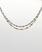 In sich gedrehte Edelstahl Kette mit 18k Vergoldung. Wasserfest und hypoallergen.
